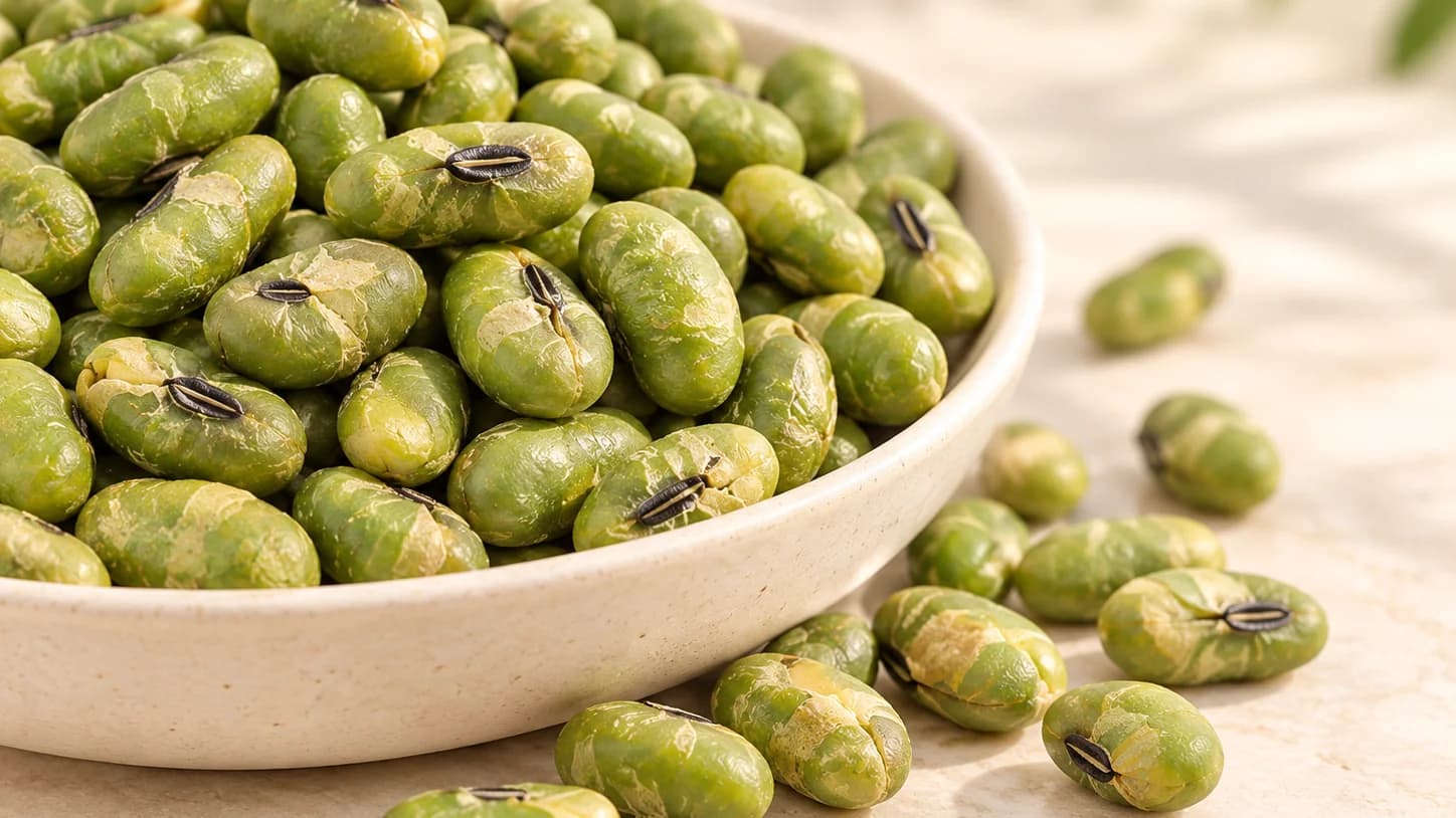 Roasted edamame beans served in a ceramic bowl