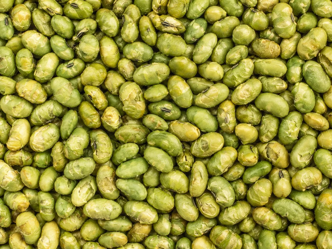 Close-up of the surface texture of roasted edamame beans